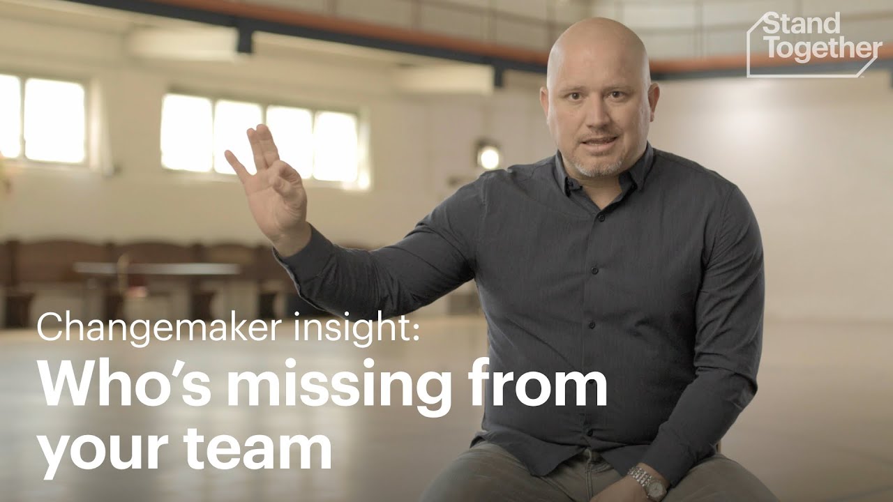 A man in a dark shirt gesturing with his hand in an indoor setting, with the text "Changemaker insight: Who's missing from your team" overlaying the image.