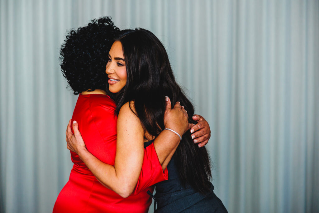Alice Marie Johnson hugging Kim Kardashian