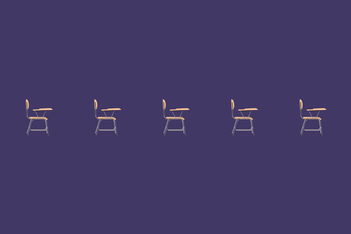 Abstract image of 5 school desks in a row